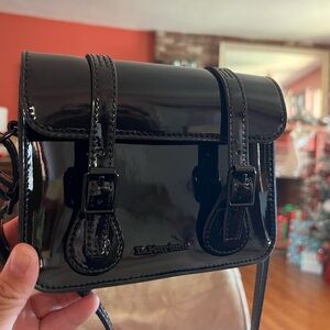 Dr. Martens Black patent leather bag.
